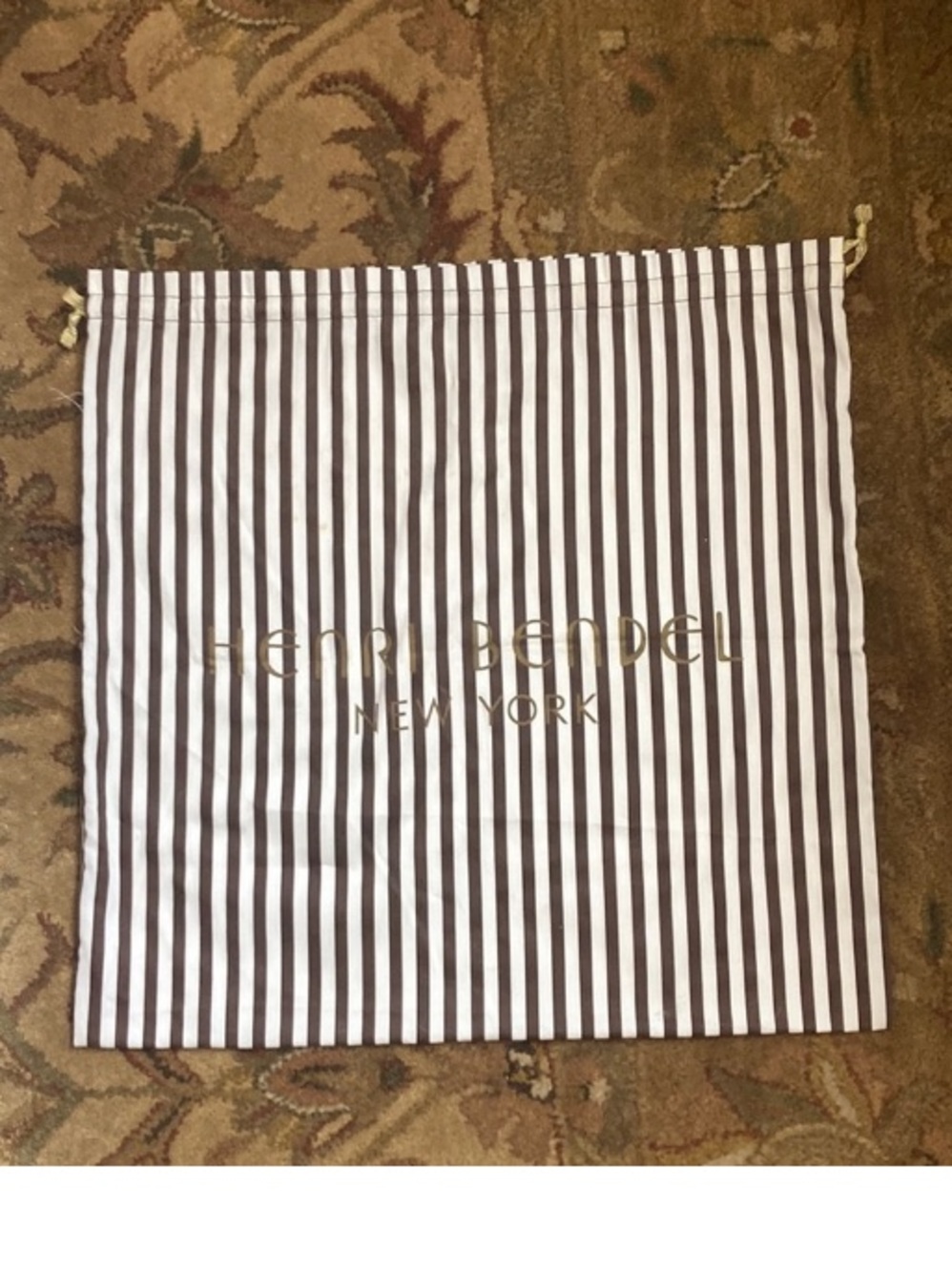 Henri Bendel Brown and White Striped Dust Bag.